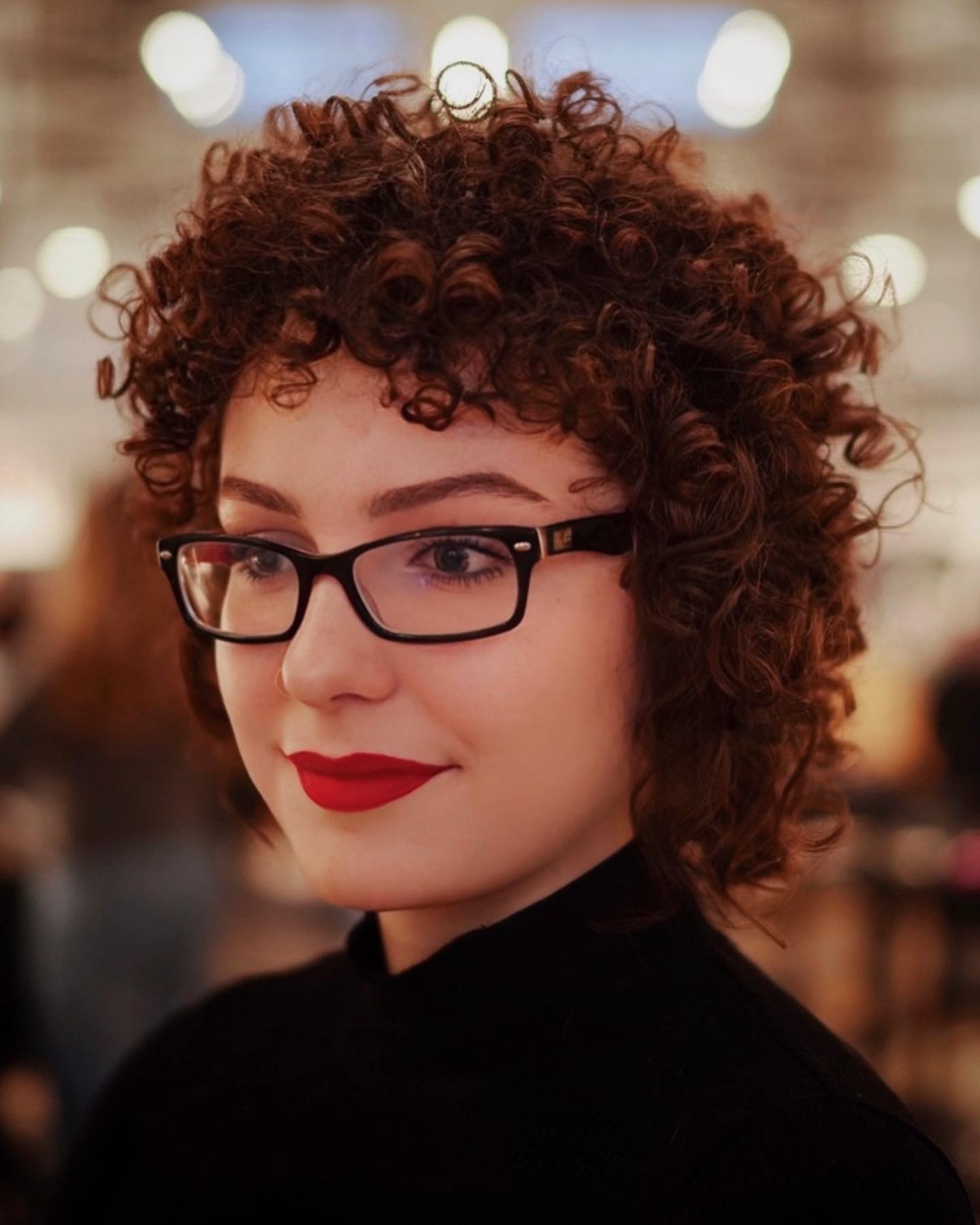 Short Curly Style with Glasses for Round Faces